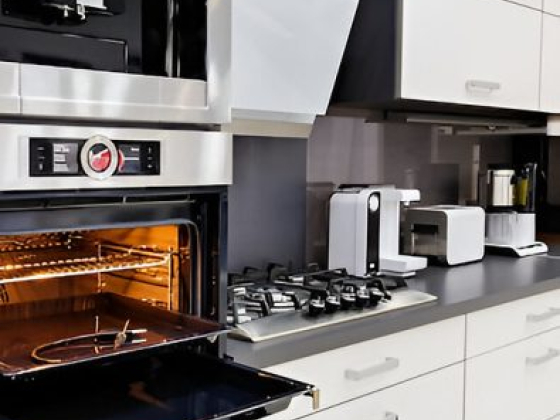 Stylish kitchen featuring open oven and countertop appliances