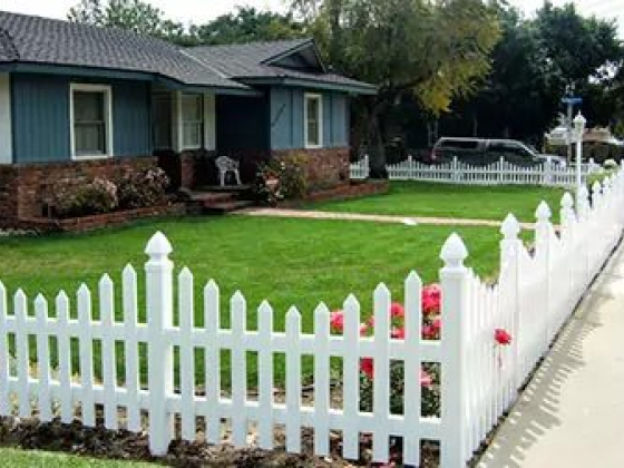 Charming home with a classic white picket fence