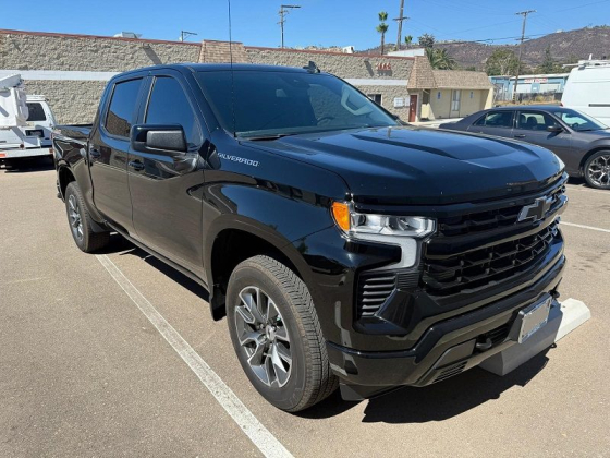 Chevrolet Silverado parked under clear blue sky