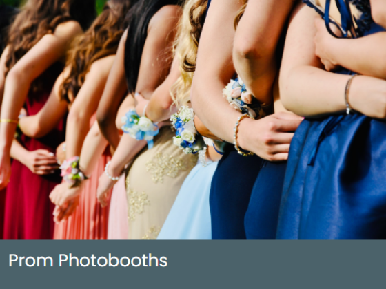 Line of prom attendees in colorful dresses with corsages