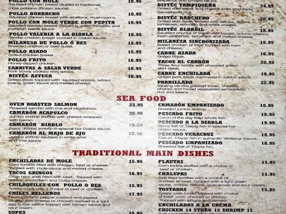 Menu with various poultry, meat, seafood, and traditional dish options