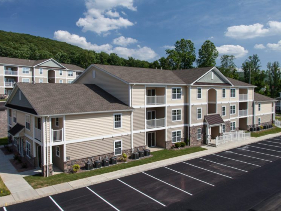 Modern apartment building in a serene suburban setting