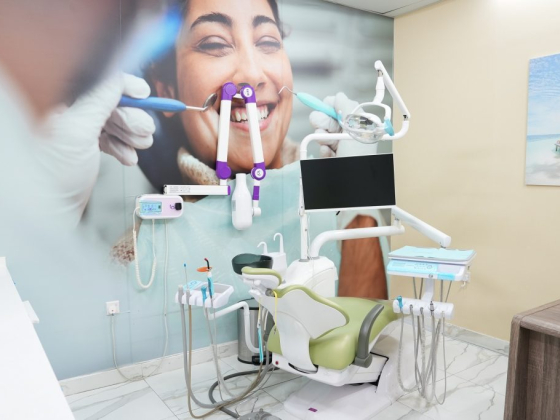 Dental chair and equipment in a clean, modern dental clinic