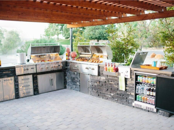 Design the perfect outdoor kitchen with essential features like a grill, seating, and counter space.