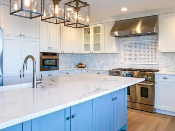 Stylish kitchen featuring elegant fixtures and marble countertops.