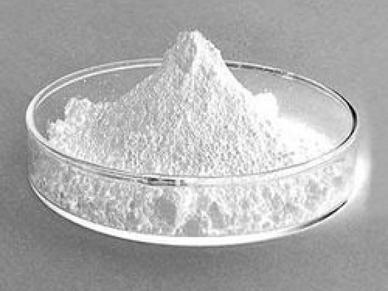 Fine white powder displayed in laboratory setting