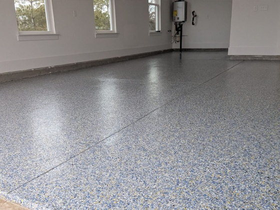 Newly finished epoxy floor in a spacious garage