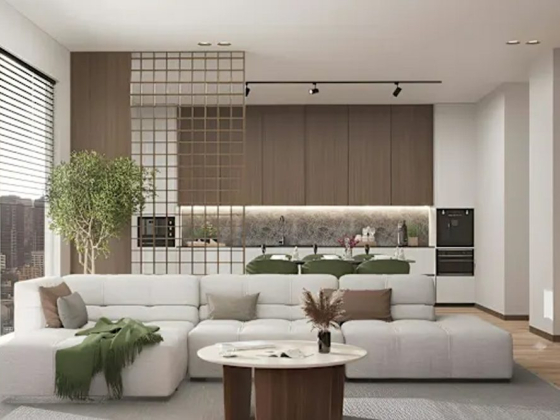 Stylish open-plan living area with kitchen and large sofa