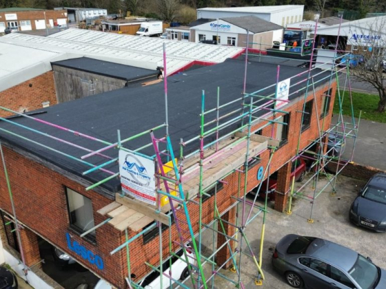 Aerial view of scaffolding on a brick building