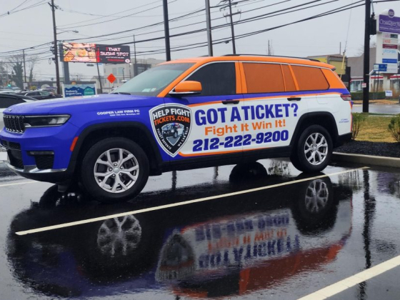 Colorful SUV advertises traffic ticket defense