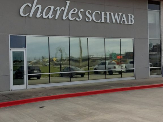 Front of a Charles Schwab office with large windows