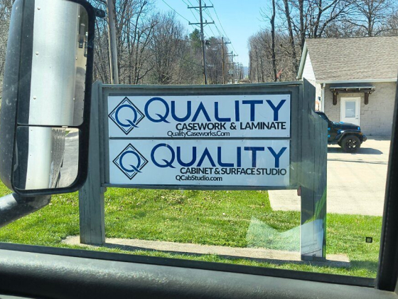 Quality casework and cabinetry business sign on a sunny day