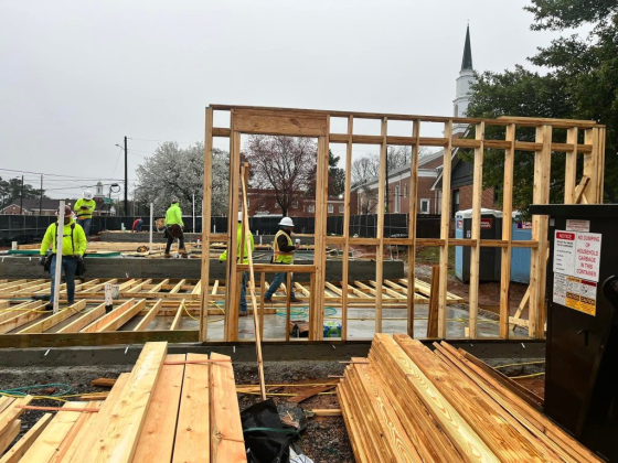 Workers forming structure on a construction site