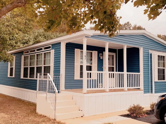 A well-kept mobile home in a serene setting