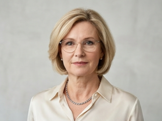 Woman in white blouse with glasses portrait