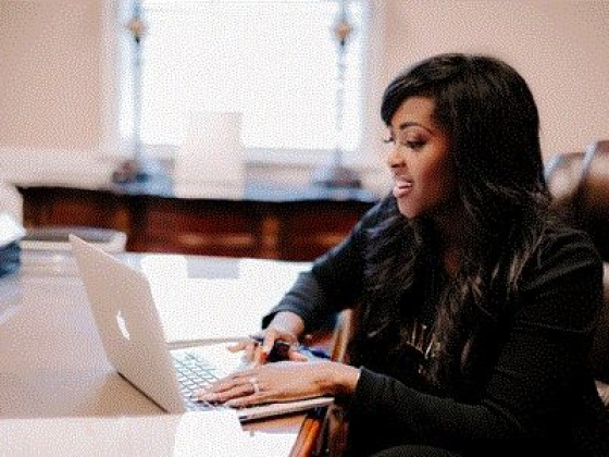 Businesswoman focusing on computer tasks