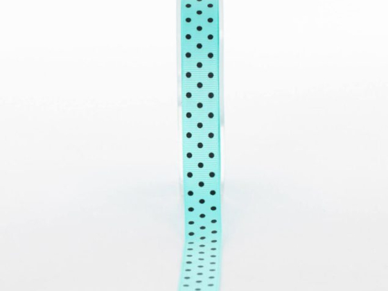 Vertical view of a polka dot ribbon roll