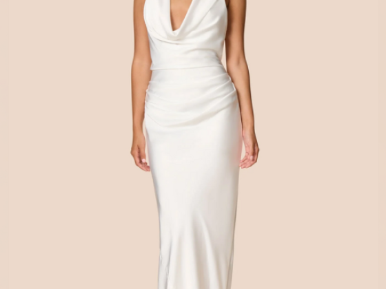 Model showcasing a sleek white evening dress