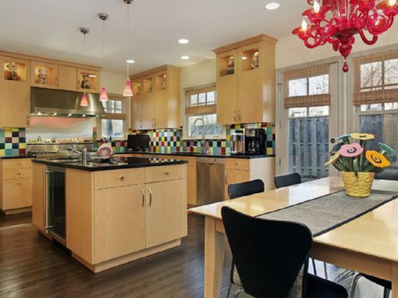 Spacious kitchen featuring a vibrant design and contemporary decor