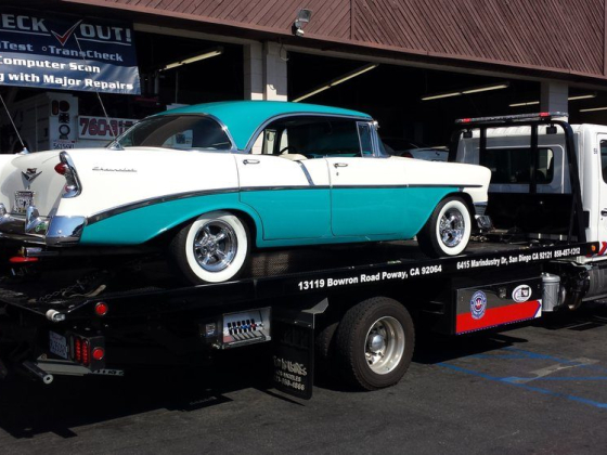 Vintage car being towed for major repairs