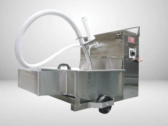 Portable metal machine with hose attached